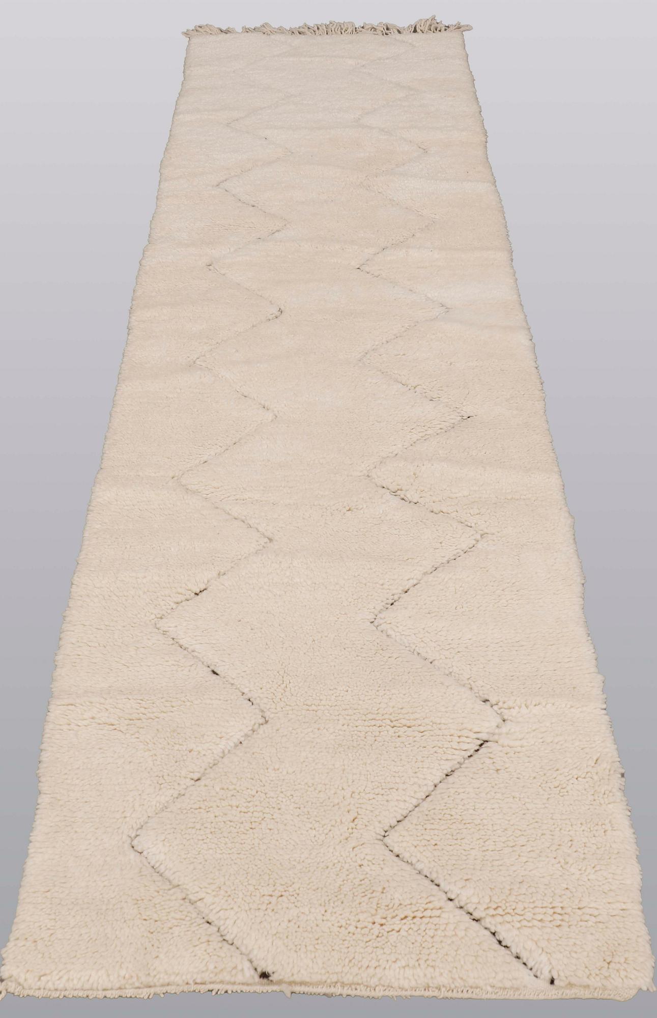 A Moroccan runner carpet, 290 x 70 cm.