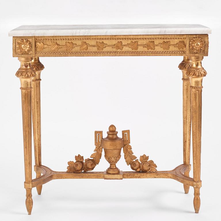 A Gustavian carved giltwood and marble console by O. C. Lindmark (master in Stockholm 1779-1813).