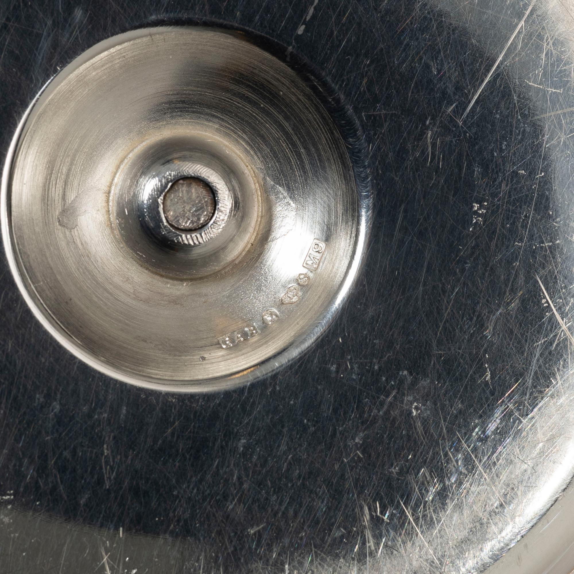 A Swedish silver Sweetmeat/sauce bowl on a plate, mark of company Guldsmedsaktiebolaget, Stockholm 1962.