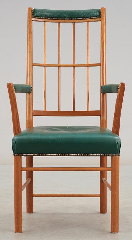 A Josef Frank mahogany and green leather armchair, Svenskt Tenn, model 652.