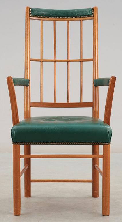 A Josef Frank mahogany and green leather armchair, Svenskt Tenn, model 652.