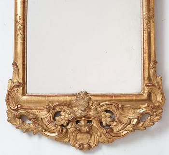 A Swedish Rococo mirror by Nils Sundström (master in Stockholm from 1757), dated 1770.