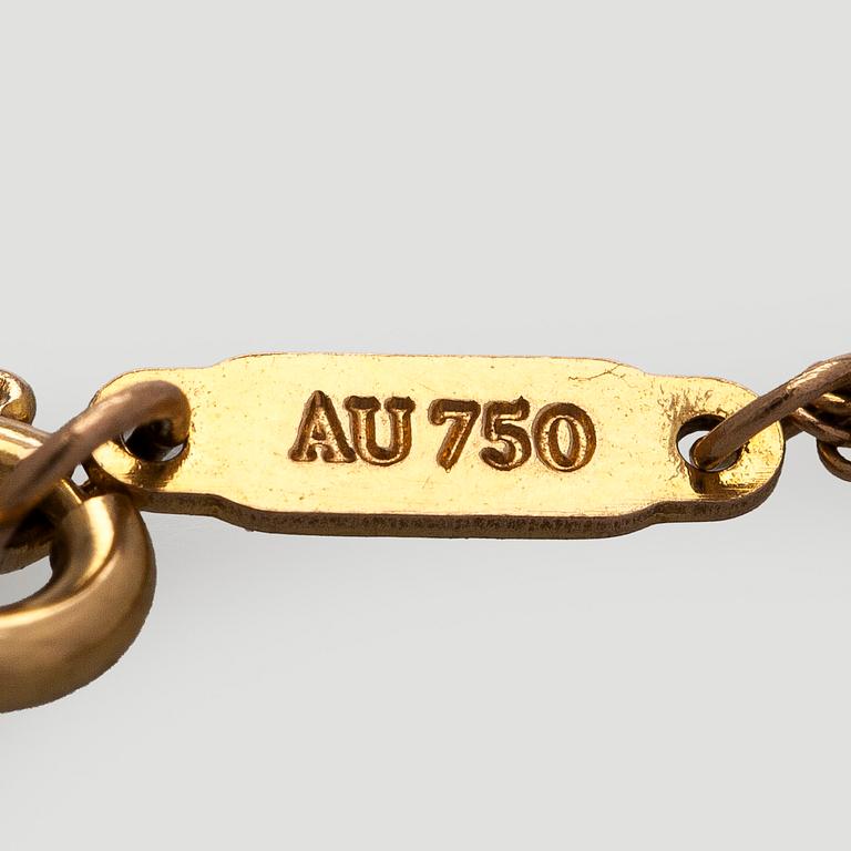 Tiffany & Co, armband, 18K guld med en briljantslipad diamant.