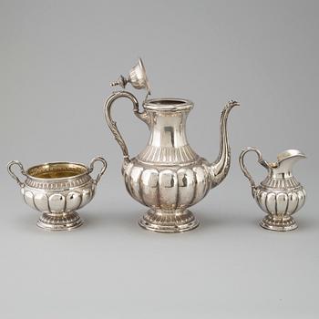 A three-piece silver coffee service, marked WP, Turkku, Finland, dated 1894 and 1897.