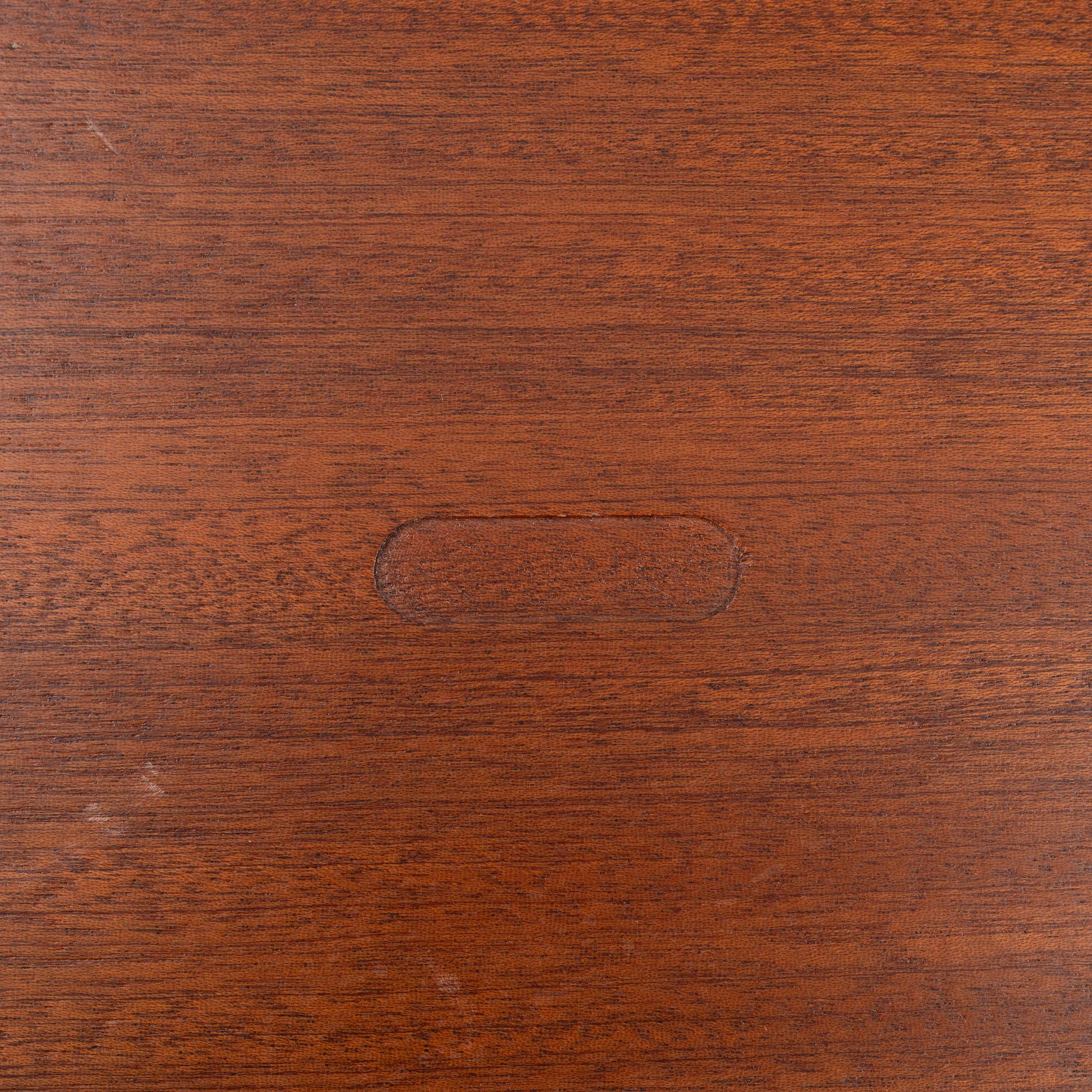 Josef Frank, a model B1034 mahogany 'Mjölkpallen' stool, Firma Svenskt Tenn, Sweden, post 1985.