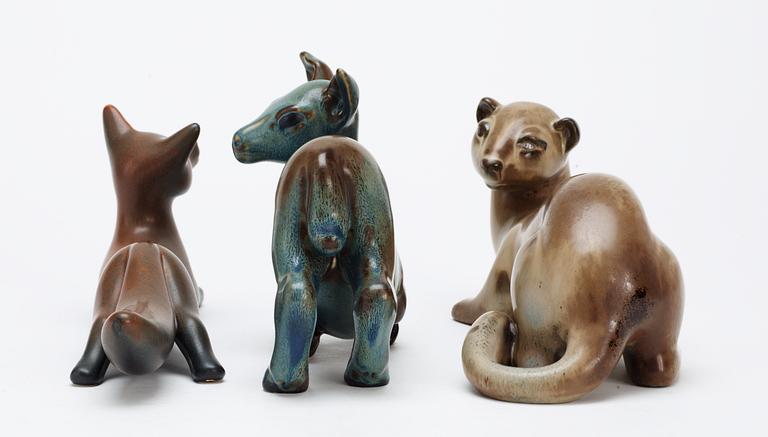 Three Gunnar Nylund stoneware figures, a deer, a fox and a ferret,