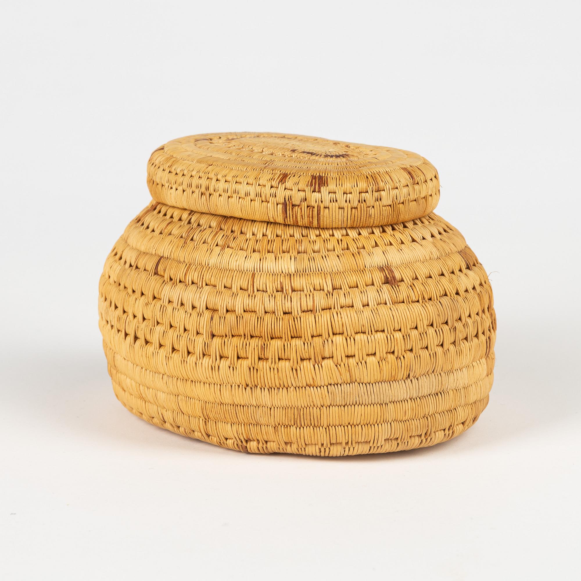A birch root box by Ellen Kitok-Andersson, signed and dated 1977.