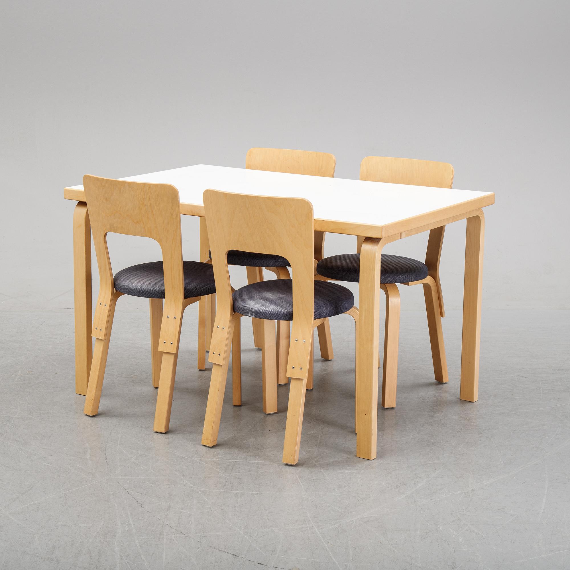 An 'Aalto' table and four chairs model 66 by Alvar Aalto for Artek, designed 1935.