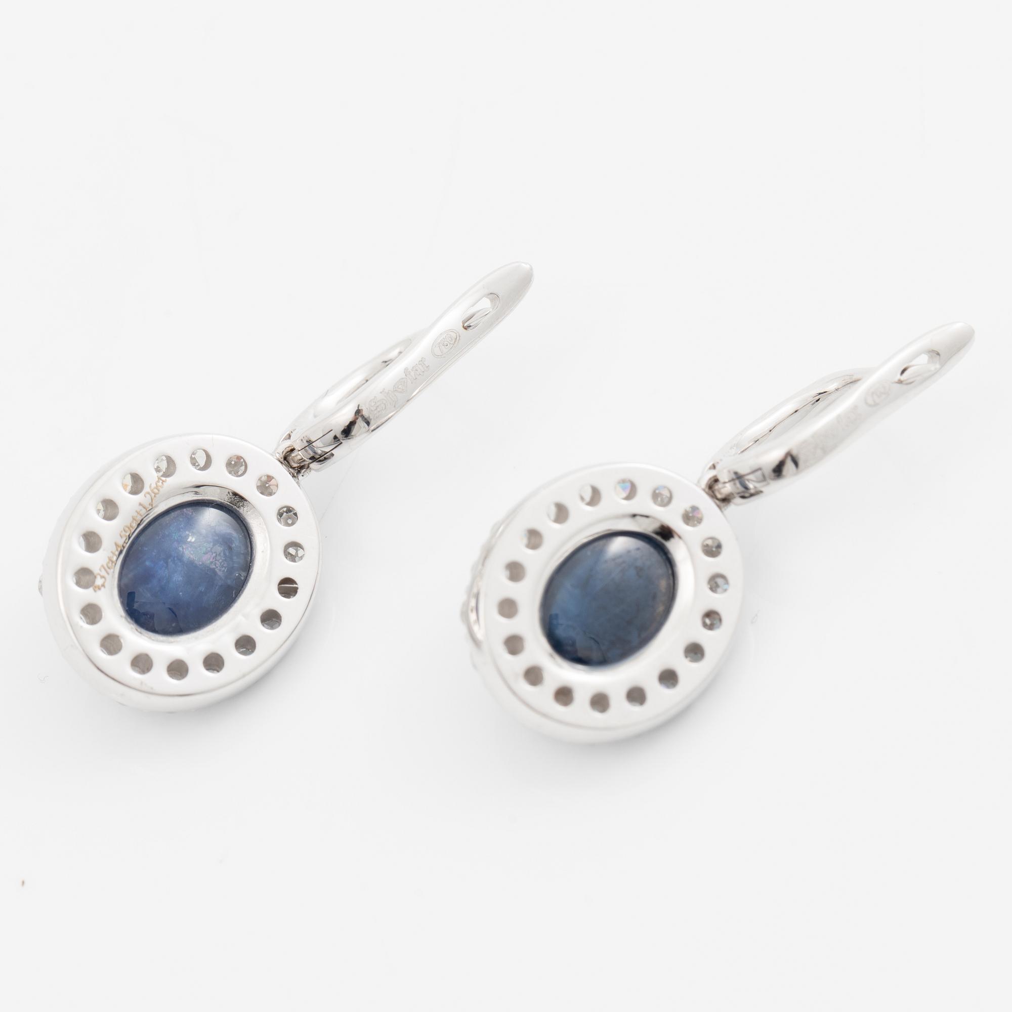 Örhängen 18K vitguld med cabochonslipade safirer och åttkantslipade diamanter.