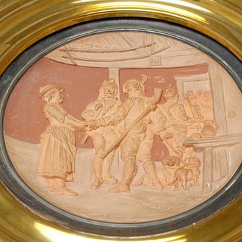 A wall plaque, 19th century.