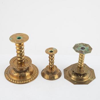 Three pair of brass Baroque style candlesticks, around 1900.