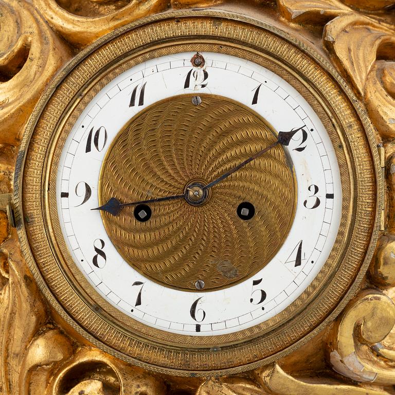 A rococo style table clock, 19th Century.