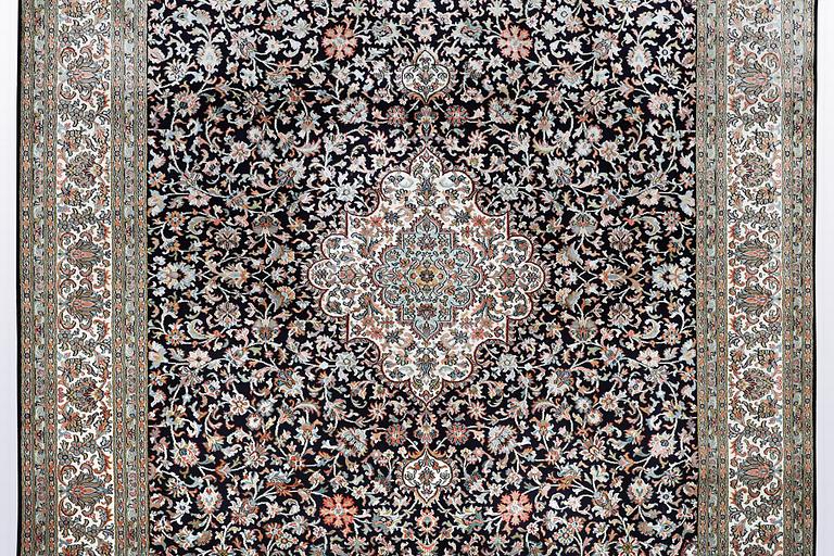 A carpet, silk Kashmir, ca 279 x 195 cm.