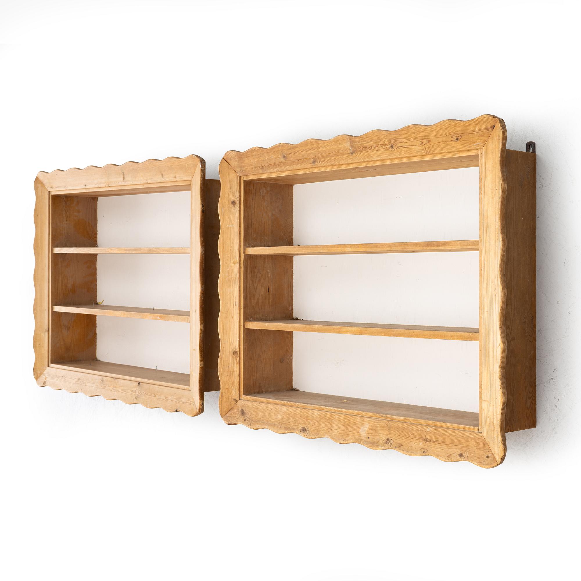 Swedish Modern, a pair of pine wall-mounted shelves, Swedish, 1930s/40s.