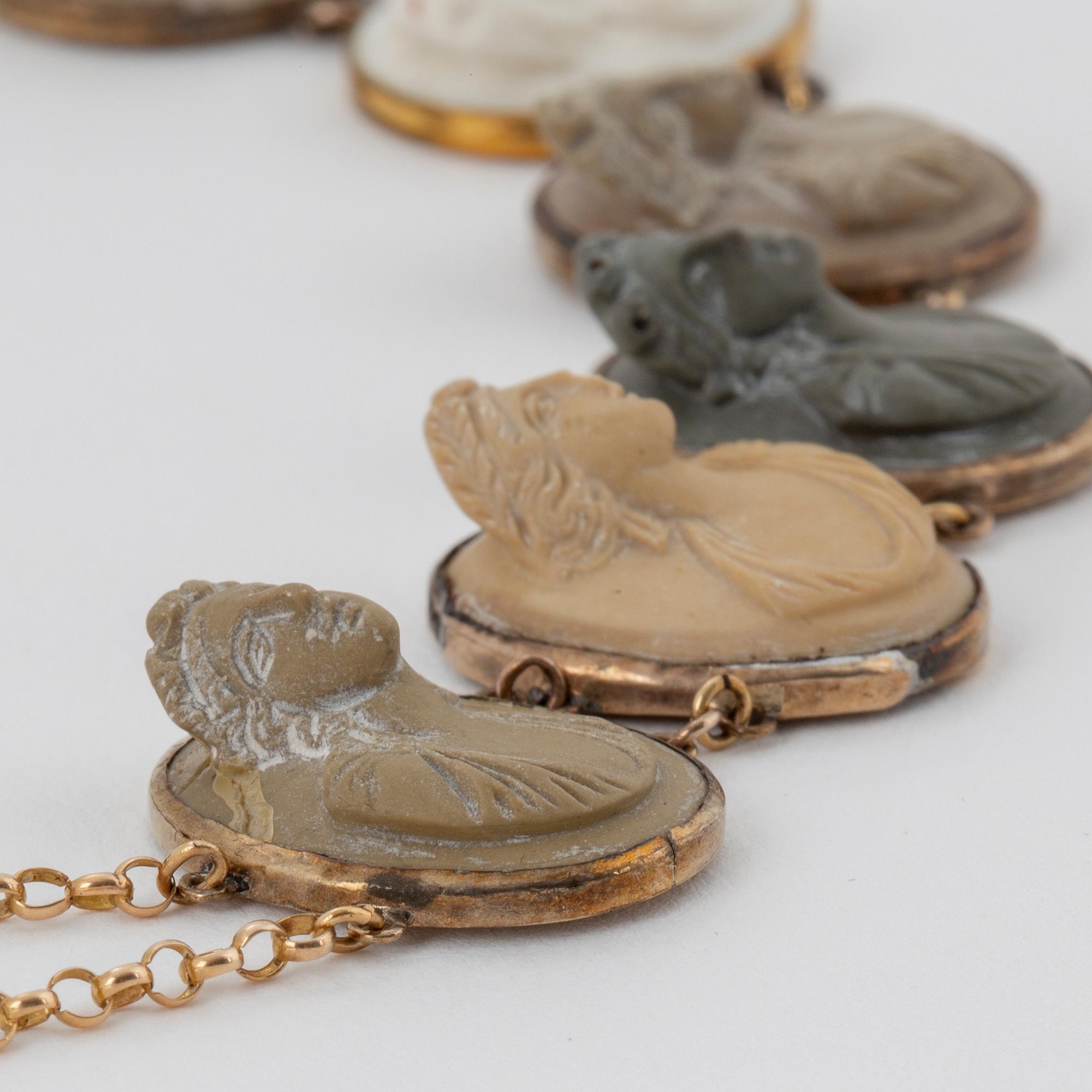 Silver and lava cameo necklace and bracelet.