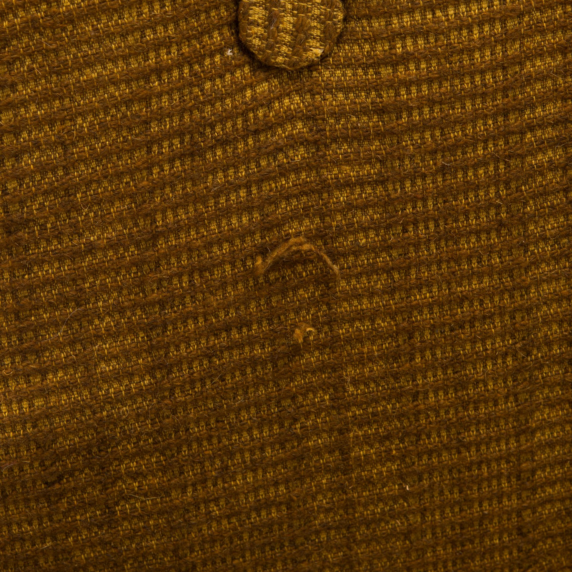 A pair of 1970s armchairs.