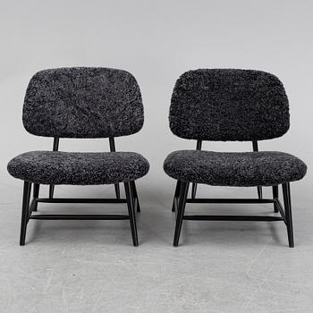 A 1950's pair of 'TeVe' easy chairs by Alf Svensson.