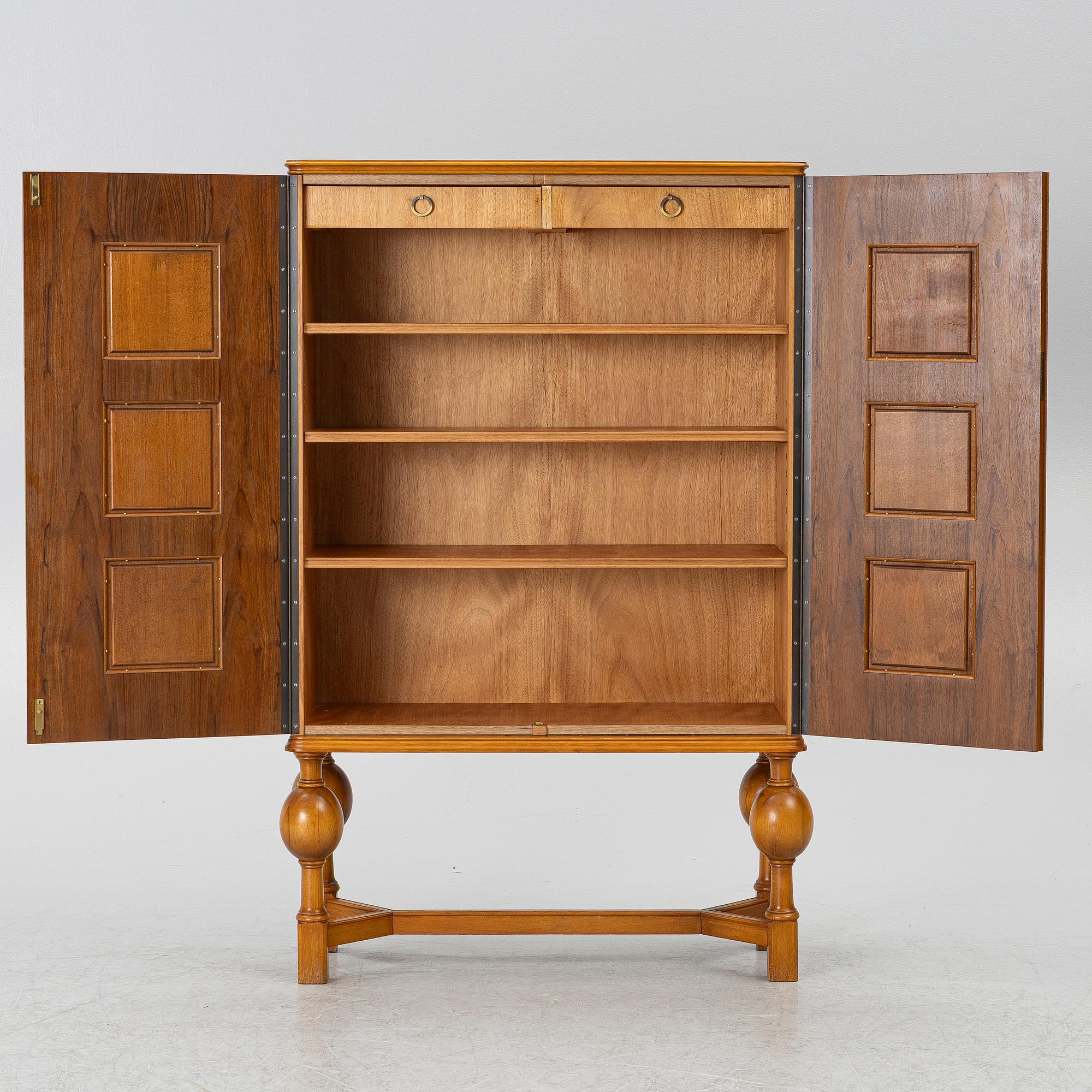 Eugen Höglund, a walnut cabinet, executed in his workshop in Vetlanda, Sweden 1950s.