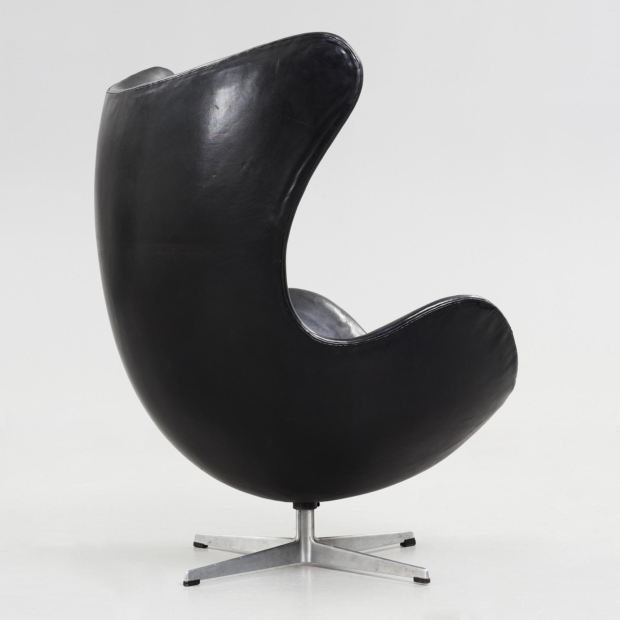 An Arne Jacobsen black leather 'Egg' chair, Fritz Hansen, Denmark 1960's.