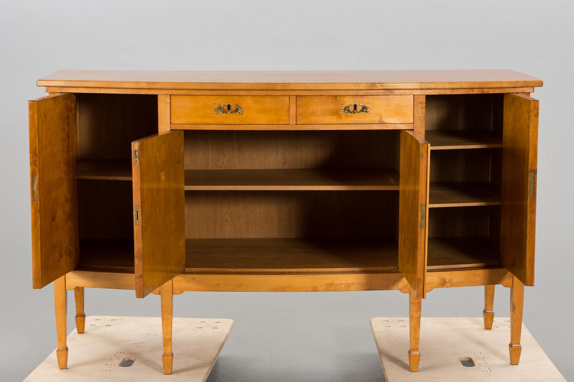 A REGENCY STYLE SIDEBOARD, first half of 20th century.