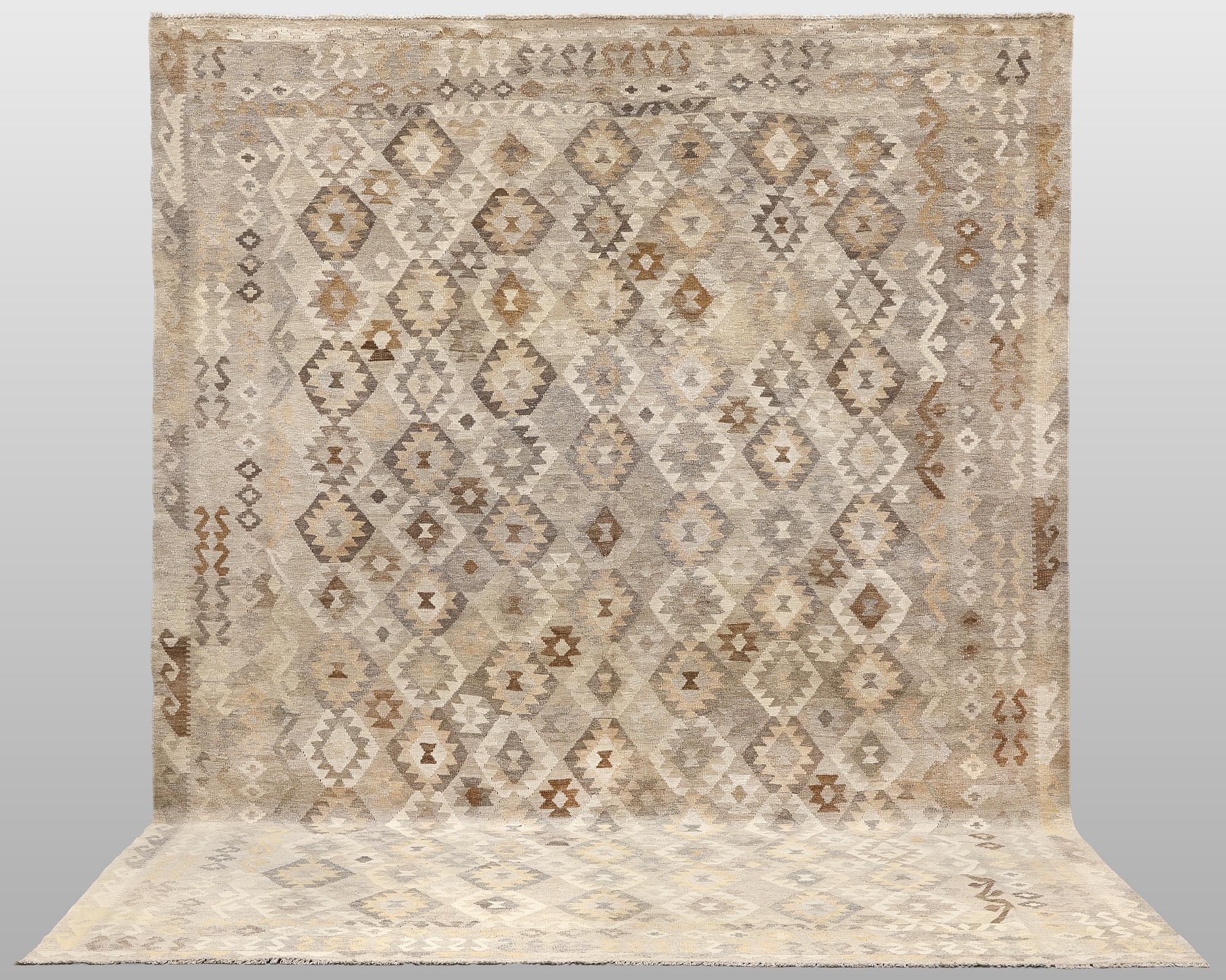 A Kilim carpet, approx. 352 x 252 cm.