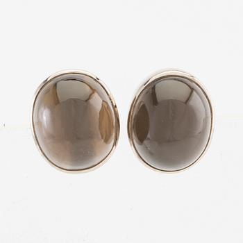 Earrings, a pair of 18K white gold with cabochon-cut grey moonstones, Gunnar Fahlström, Stockholm 1955.
