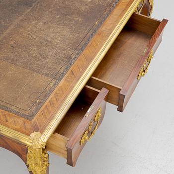 A French Napoleon III Louis XV-style parquetry and gilt bronze-mounted desk, second half of the 19th century.
