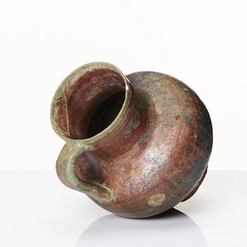 A 12-13th century turquoise and black underglazed jug.