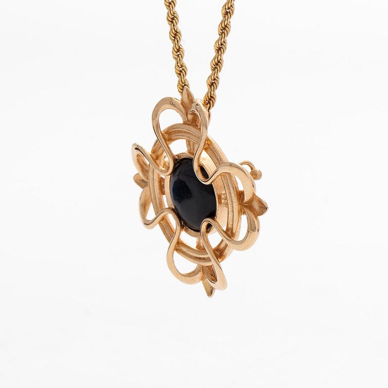 Kalevala Koru, a pendant/brooch with chain, "Lily", 14K gold and spectrolite. Helsinki 2002.