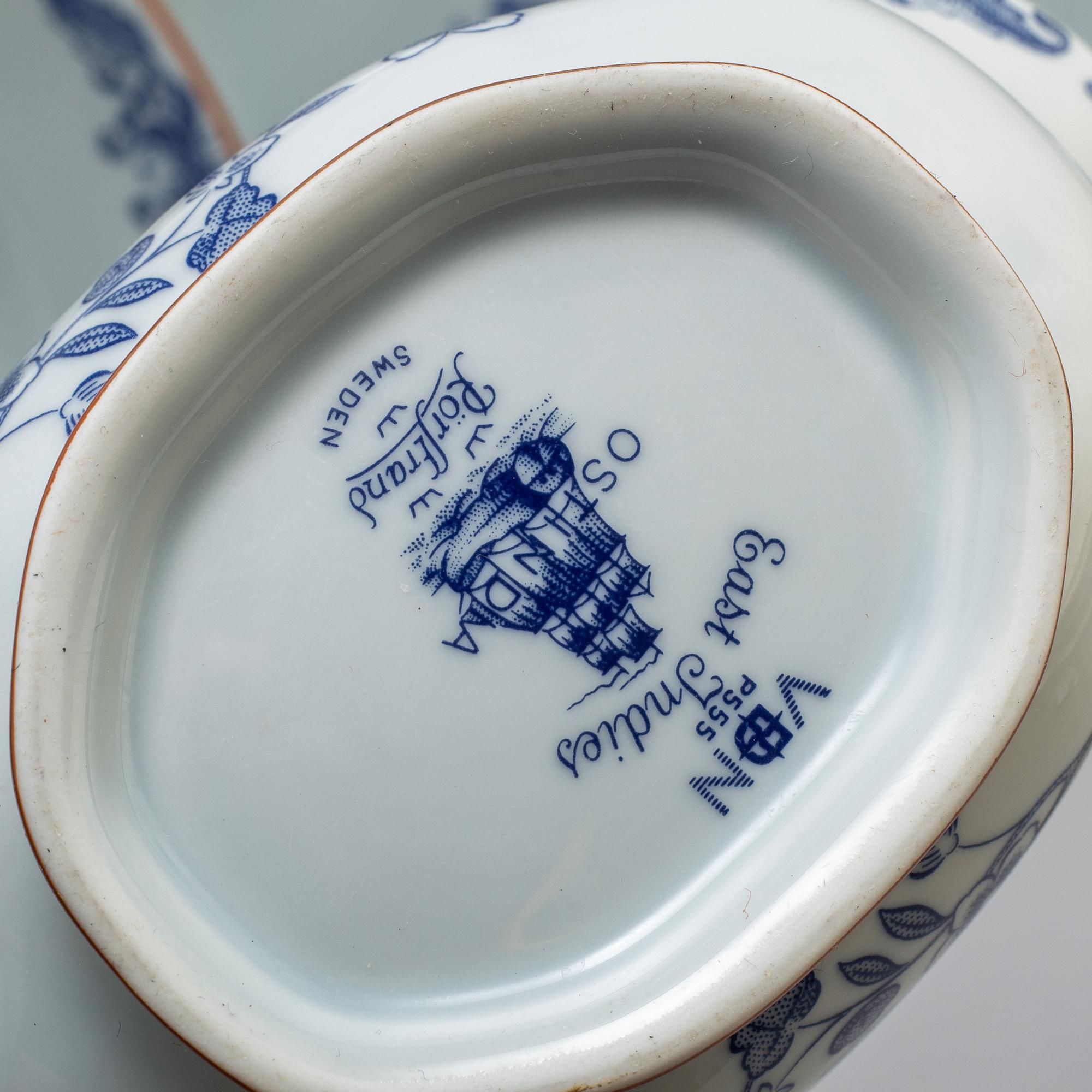 A part 'Ostindia' earthenware service, from Rörstrand (53 pieces).