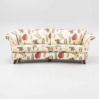 A curved sofa from Bröderna Andersson.