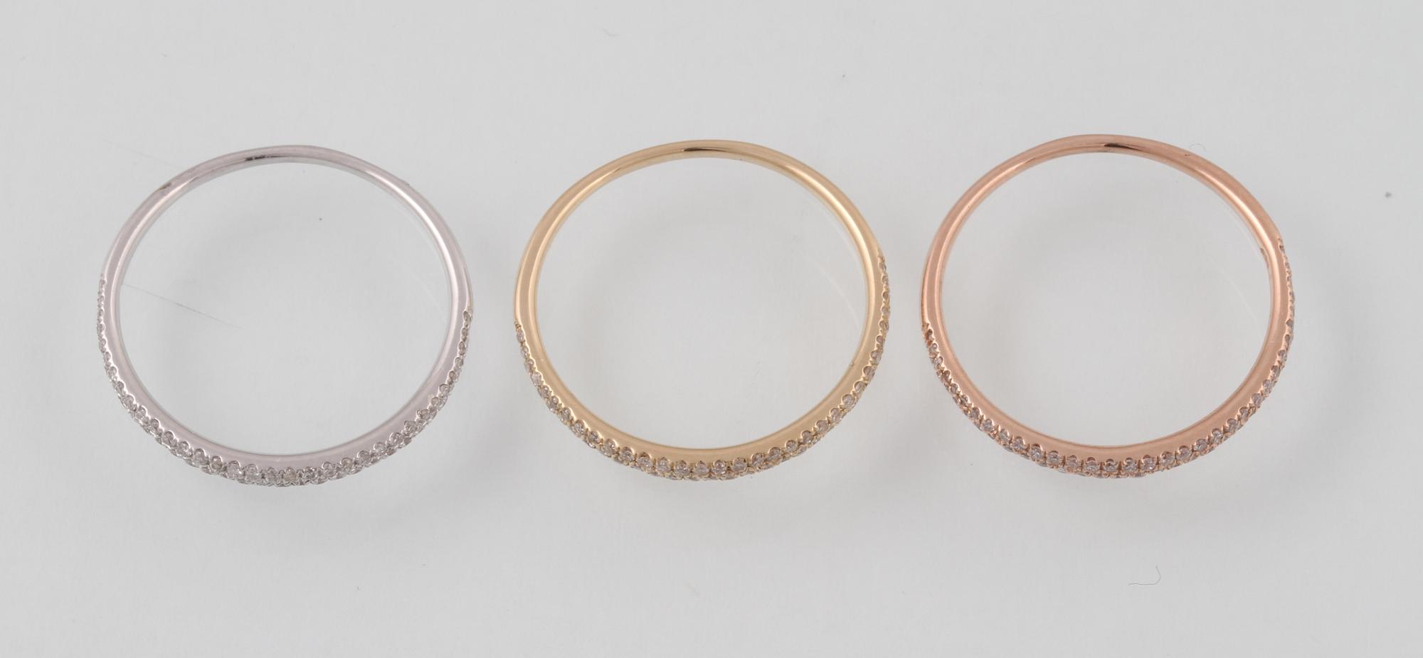 RINGAR, 3 st, 14K trefärgat guld med briljantslipade diamanter totalt ca 0.54 ct. Vikt 3,4 gram.