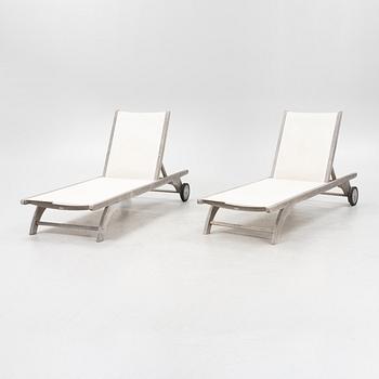 A pair of 'Columbus Sunbed' teak deck chairs, Skagerak, Denmark.