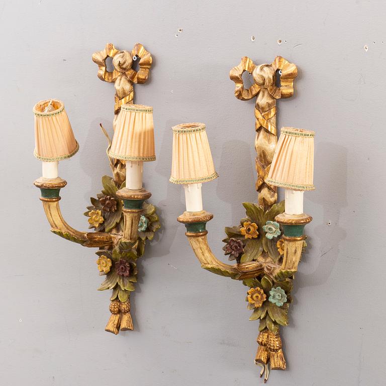 A pair mid 20th century wooden wall lamps from Paoletti, Firenze Italy.