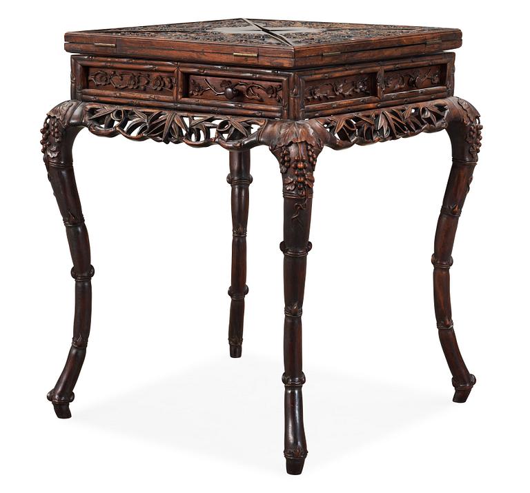 A hardwood games table, late Qing dynasty (1644-1912).