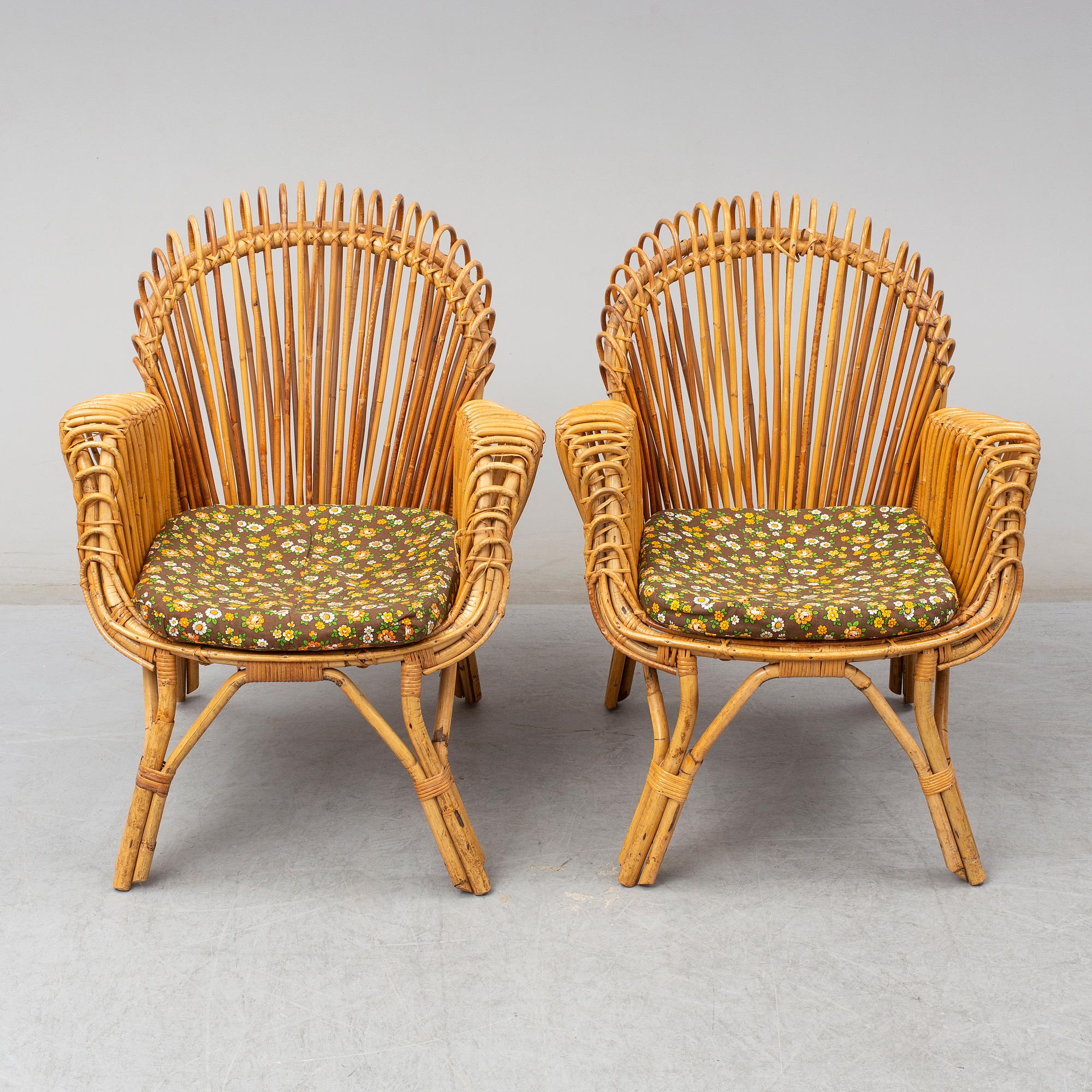 A pair of rattan armchairs, Emilio Paoli, via Vigna Nuova, 8, Firenze, Italy, second half of the 20th century. Signed.
