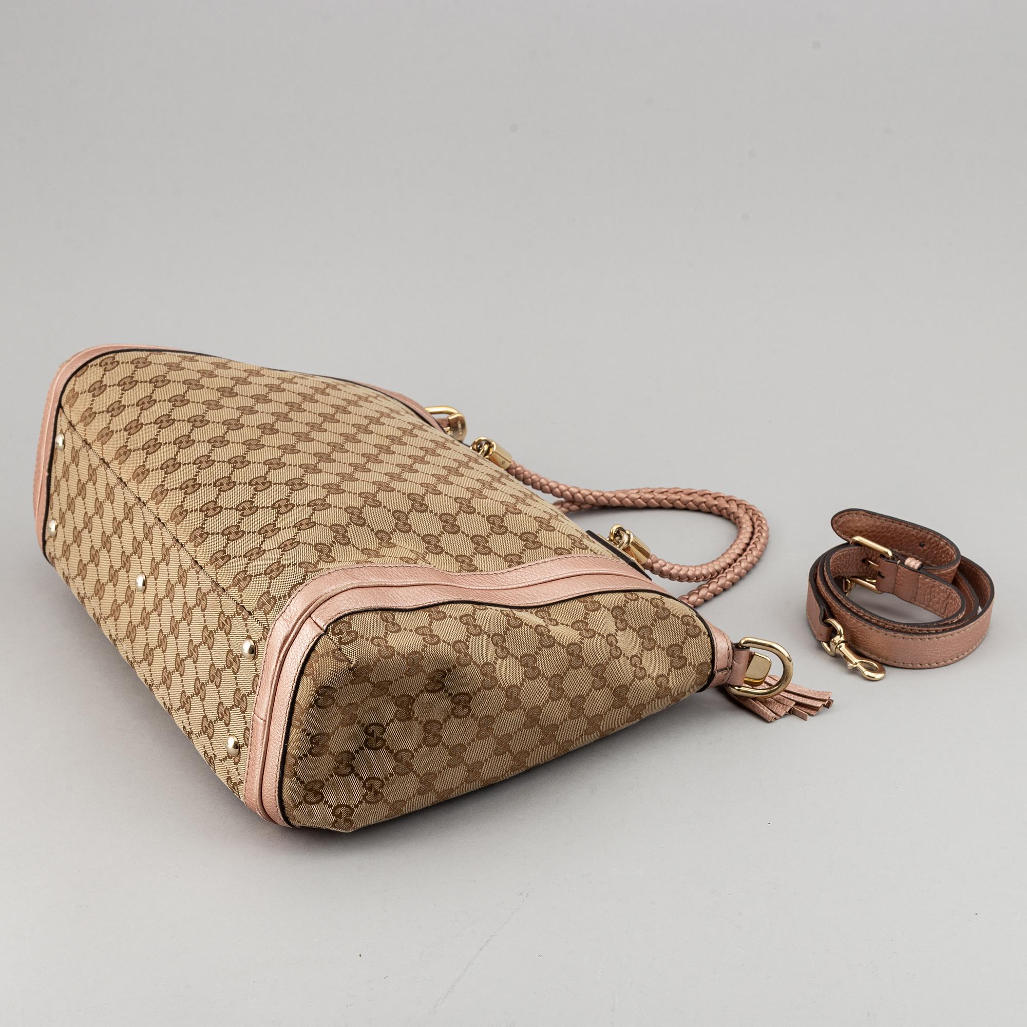 Gucci, a monogram canvas bag.