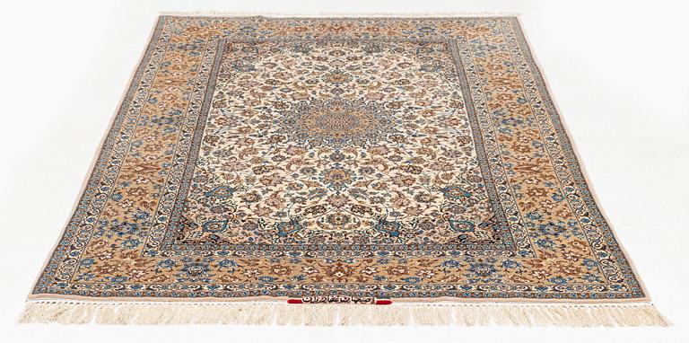 A signed, part silk, Isfahan rug, c. 244 x 149 cm.