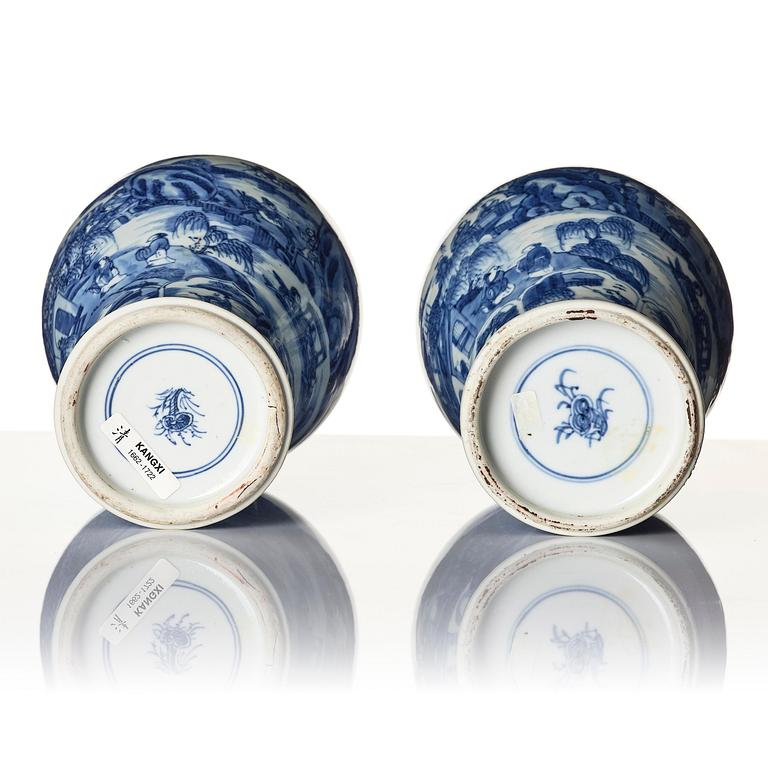 A pair of blue and white 'landscape' vases, Qing dynasty, Kangxi (1662-1722).