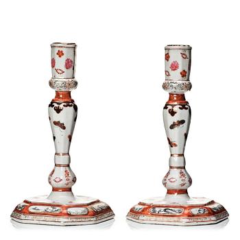 767. A pair of rouge de fer and grisaille export candle sticks, Qing dynasty, Qianlong (1736-95).