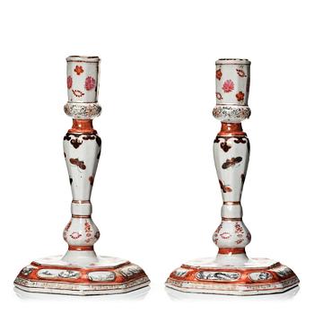 767. A pair of rouge de fer and grisaille export candle sticks, Qing dynasty, Qianlong (1736-95).