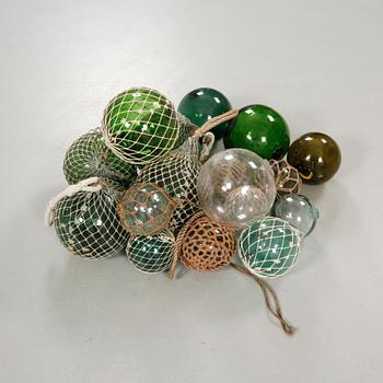 Seventeen glass fishing floats, 20th century.