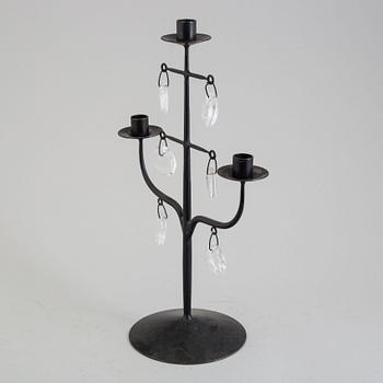 An iron and glass candelabrum by Erik Höglund, Boda Smide.