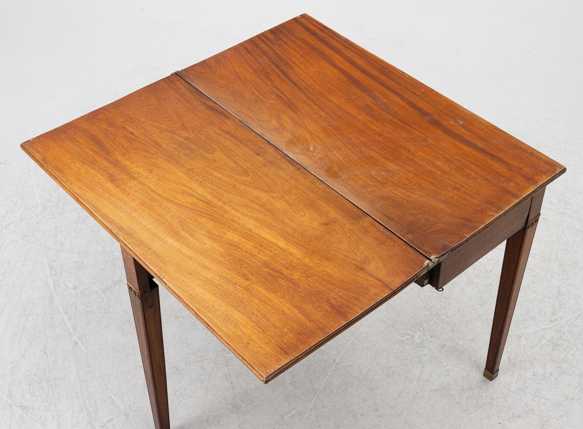 A late Gustavian mahogany games table, 18th century.