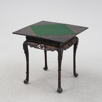 A Chinese hardwood games table, around the year 1900.