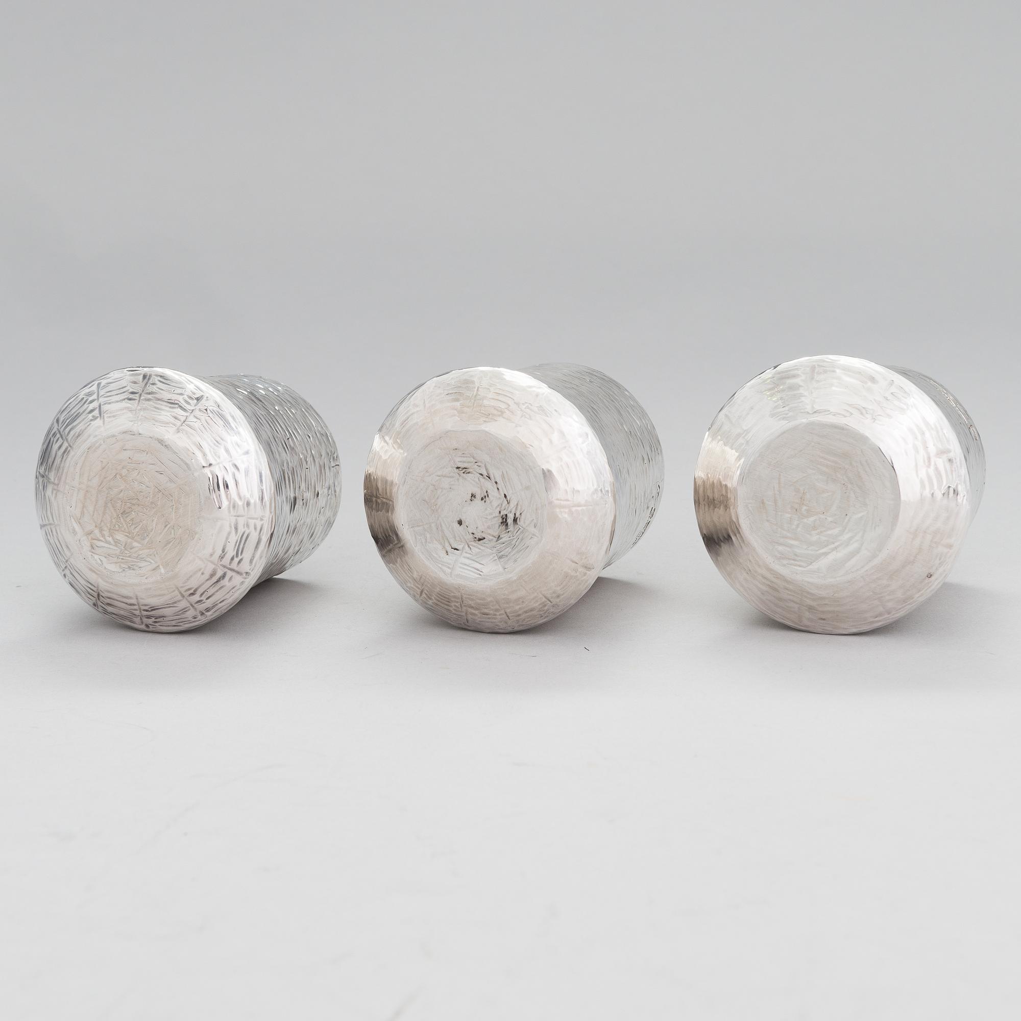 TAPIO WIRKKALA, A set of three silver beakers, marked TW, Kultakeskus, Hämeenlinna, Finland 1976.