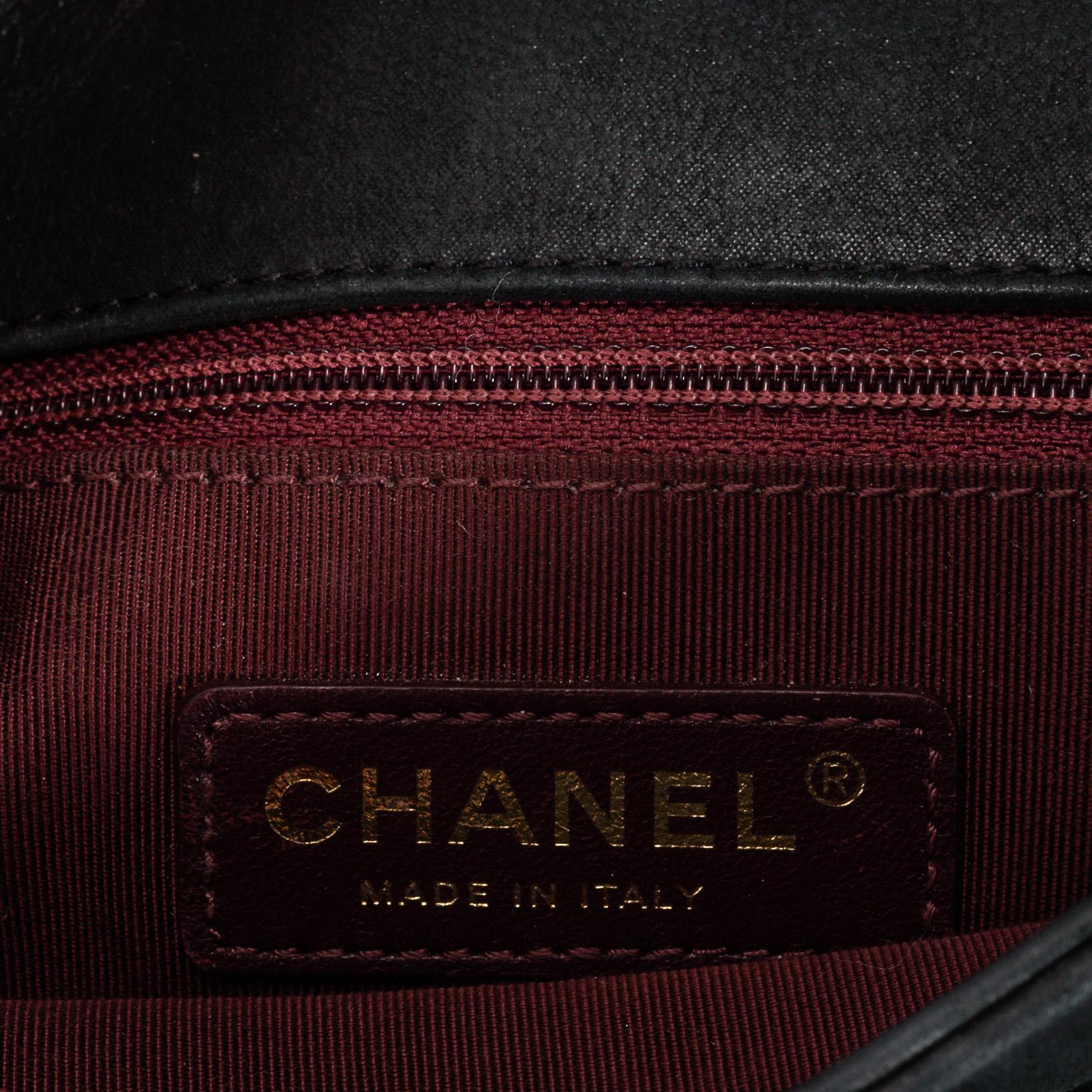 CHANEL, a black quilted fabric 'Flap Bag', 2015-2016.