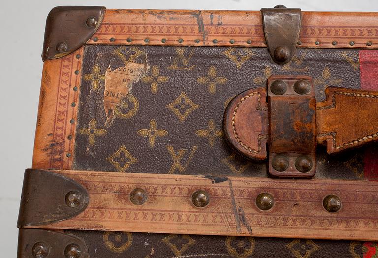 An early 20th cent monogram canvas trunk by Louis Vuitton.