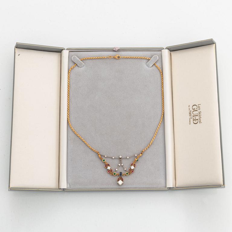 diamond, rubies, and emerald and sapphire necklace.