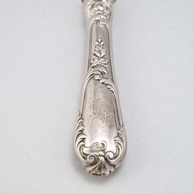 A pair of Louis VI-style serving cutlery, France 19th century.